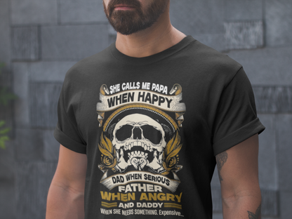 Person wearing a black t-shirt with a skull design and text.